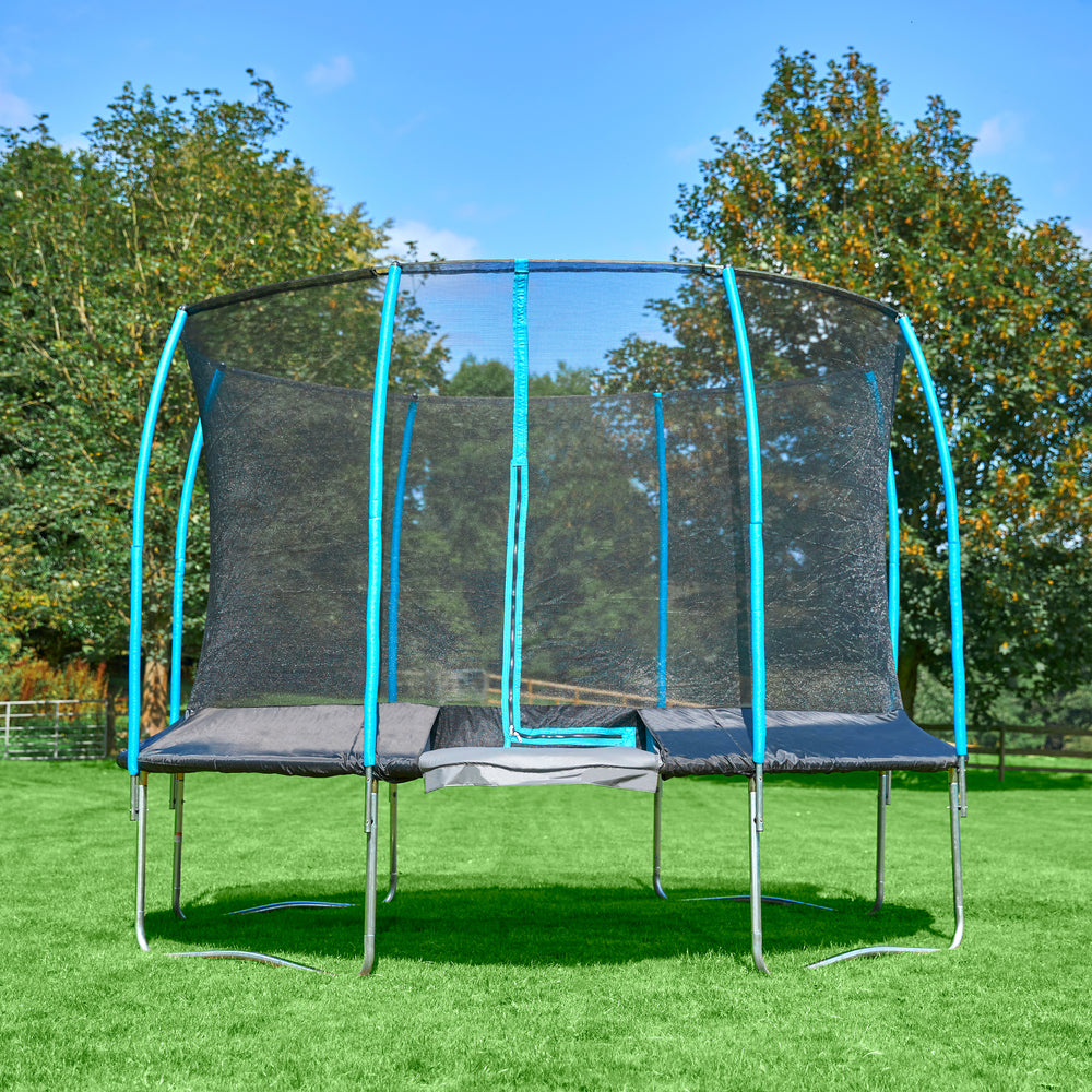 12ft trampoline with enclosure in a sunny garden