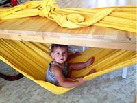 Kids will love creating a hammock den
