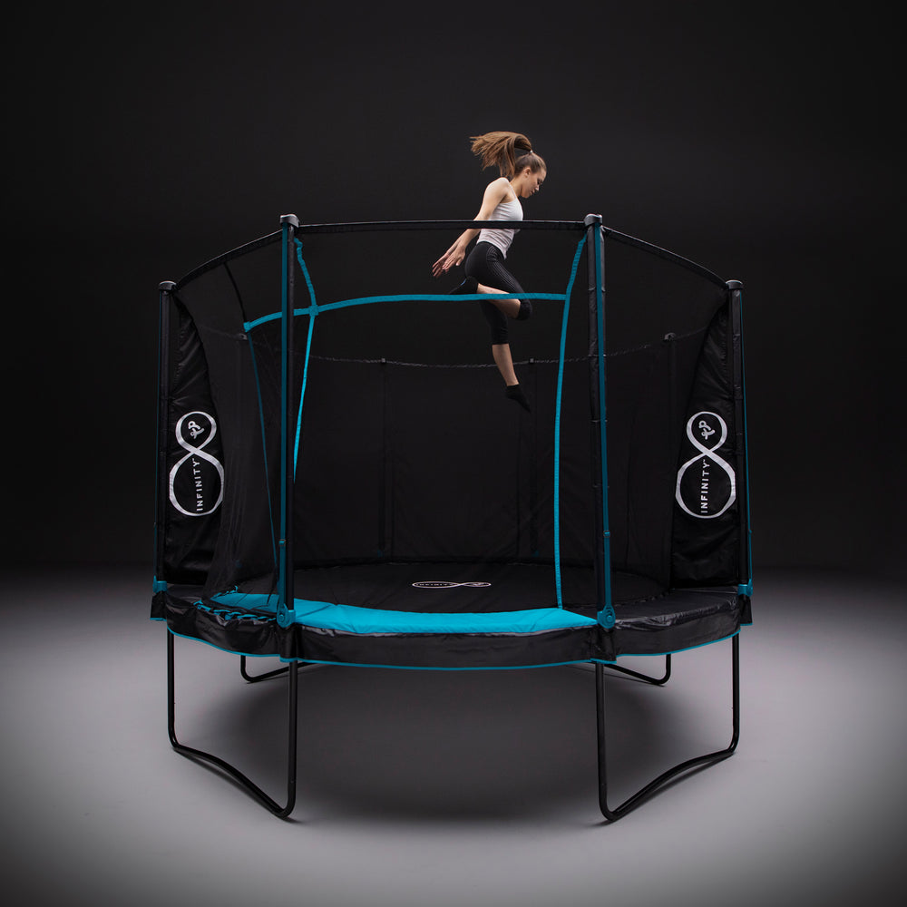 teenage girl jumping on 14ft Infinity round trampoline