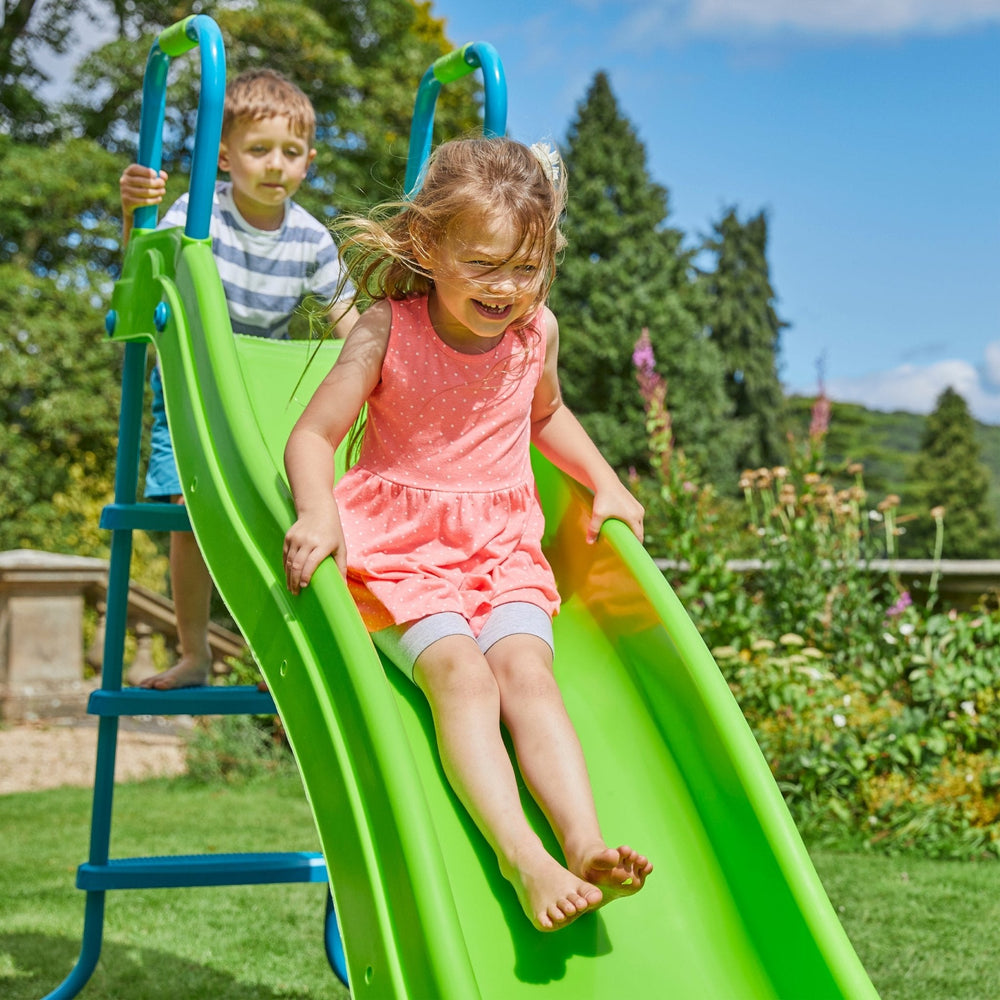 Children playing on outdoor slide