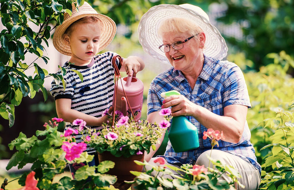 Children playing with potting bench