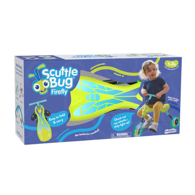 The Scuttlebug Firefly by TP Toys comes in packaging that shows a yellow and blue three-wheeled ride-on for ages 1-3, with a child riding. Features highlighted include easy fold & carry and motion-powered light-up wheels.