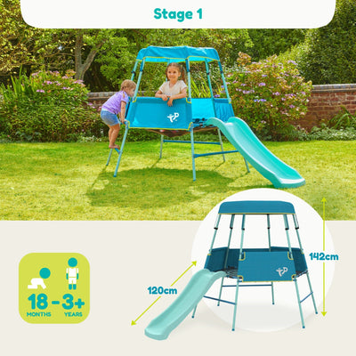 Two young children enjoy the TP Toys TP Growable Adventurer Metal Climbing Frame, which features a slide and measures 142 cm high and 120 cm long—ideal for ages 18 months to 3+ years.