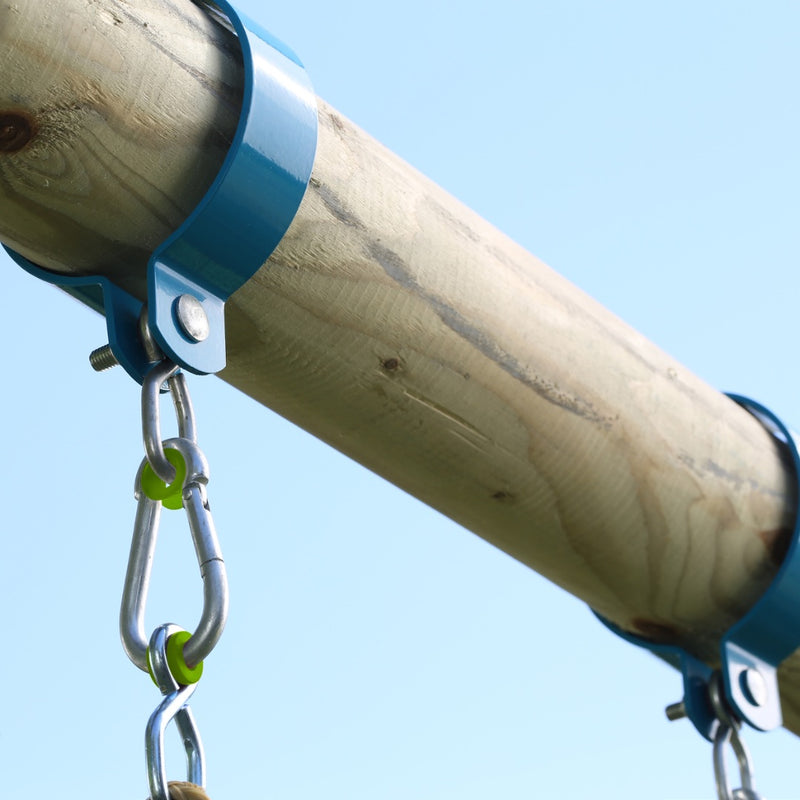 Close-up of a wooden beam with blue metal brackets and hanging chains, part of the TP Knightswood Double Wooden Swing Set With Glide Ride by TP Toys, set against a clear blue sky.