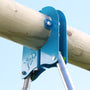 Close-up of the blue metal bracket joining a wooden beam to metal poles on the TP Toys TP Knightswood Double Wooden Swing Set With Glide Ride, with a clear sky in the background.
