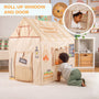 A child peers into the TP Toys Activo Farmers Market Play Tent, a playhouse with a roll-up window and door. Set up indoors or outdoors in the playroom, it’s surrounded by storage baskets and toys.