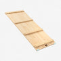 The TP Active-Tots Pikler Style Wooden Climbing Bridge and Slide by TP Toys, crafted from FSC® certified wood, is inspired by Montessori principles and features three horizontal support bars along with rubber edge protectors at one end. This versatile piece of indoor play equipment is showcased against a light background.