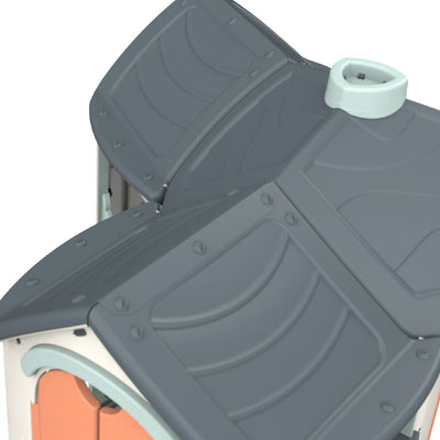 The roof of the TP Toys Palplay Grand Villa Plastic Playhouse features gray panels with raised lines and white and orange trim—an ideal design to spark imaginative play in any outdoor setting.