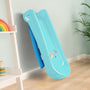 A compact blue TP Toys Bluey Plastic Folding Slide with Bluey characters, set indoors on a wooden floor beside a shelf and a plant.
