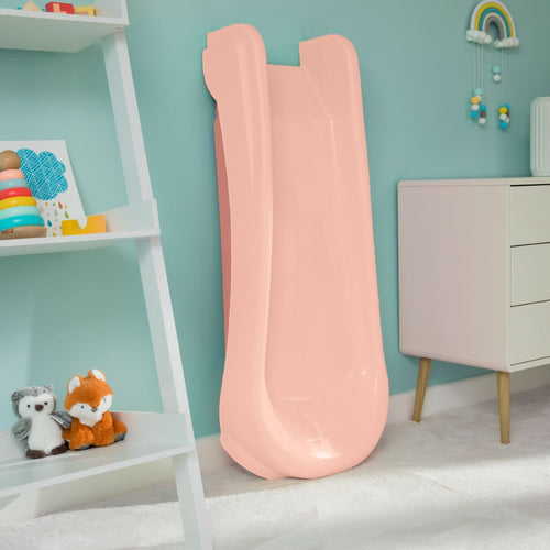 The TP Toys PalPlay Pink Blush Plastic 4ft Folding Slide stands upright in a kids' room beside a white shelf with stuffed toys and a white dresser against a teal wall.