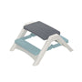 The TP Toys Palplay Folding Picnic Bench Misty Sky features a light blue step, dark gray seat, and foldable white frame—ideal as a children’s bench or for versatile indoor and outdoor seating.
