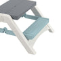 Close-up of the TP Toys Palplay Folding Picnic Bench Misty Sky, featuring a gray seat, white legs, and a textured light blue step—ideal as a children’s bench or for compact indoor/outdoor seating.