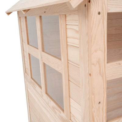 Close-up of the Buttercup Cottage Wooden Playhouse by TP Toys, featuring FSC® certified wood with visible grain, paneling, glass windows, and screws.