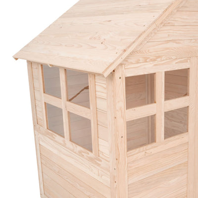 A close-up of TP Toys Buttercup Cottage Wooden Playhouse, an FSC® certified structure with two windows and a slanted roof—an ideal, charming addition to any garden for imaginative outdoor play.