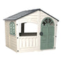 The TP Toys Palplay Plastic Playhouse of Fun Snowdrift is an outdoor playhouse with a green door, arched windows, cream walls, and a grey roof—ideal for imaginative role play.