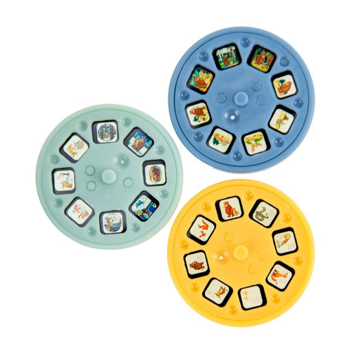 Set of three round plastic reels in blue, green, and yellow for The Gruffalo Projecter by TP Toys, each with small square images for storytelling fun.