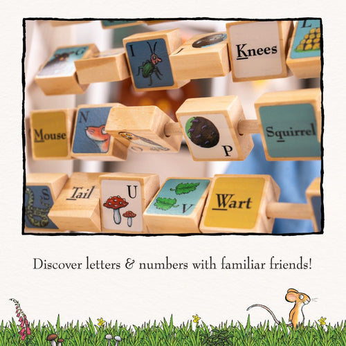 Close-up of The Gruffalo Wooden Mini Abacus by TP Toys—an FSC® certified early learning toy featuring illustrated wooden tiles with letters and matching words and images, such as Squirrel, Wart, and Knees—perfect for engaging children while encouraging the development of fine motor skills.