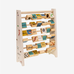 The Gruffalo Wooden Mini Abacus by TP Toys is an FSC® certified wooden educational toy featuring rotating blocks with letters, words, and pictures—perfect for teaching the alphabet, numbers, and colors while helping children develop fine motor skills and foundational knowledge, just like a classic abacus.