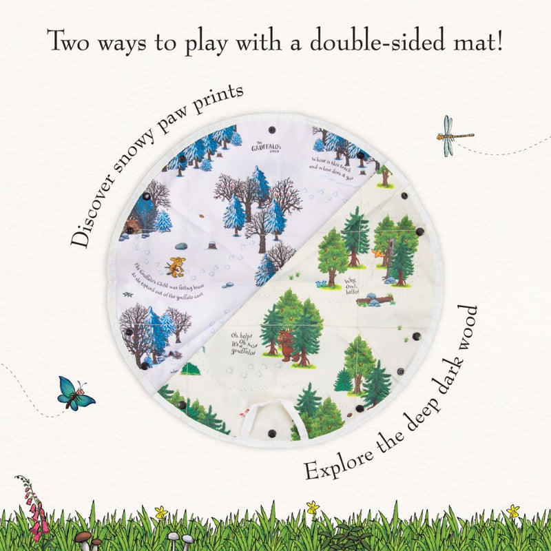 This circular, double-sided fabric playmat from TP Toys features snowy paw prints on one side and a green forest scene with illustrated trees, animals, and character quotes on the other—perfect for use with your The Gruffalo Play Set with Wooden Characters.