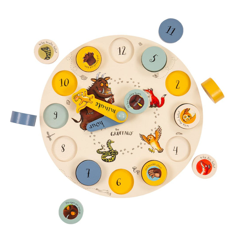 The Gruffalo Wooden Counting Clock from TP Toys is a round, FSC® certified wooden toy featuring removable number pieces and beloved characters—including the mouse, fox, owl, and snake—making it ideal for supporting early numeracy skills.