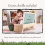 A young boy uses the TP Toys Gruffalo Wooden Creative Station - FSC® certified art easel to draw a cartoon mouse in a playroom, surrounded by toys, books, and magnetic pieces.