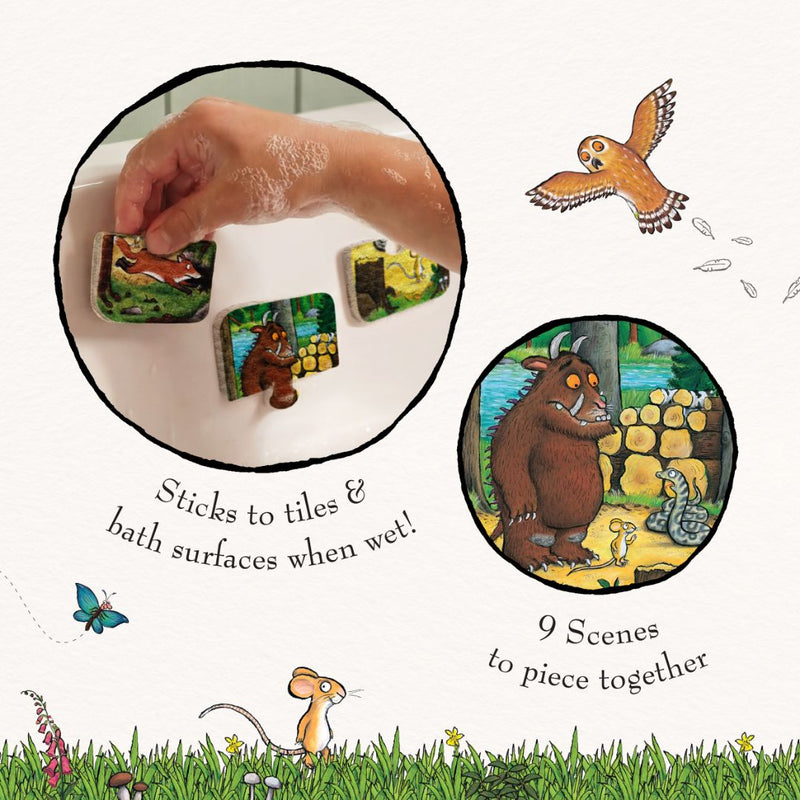 A hand places illustrated foam tiles with animal characters on a bath surface. The TP Toys Gruffalo Foam Bath Figures stick when wet and feature 9 scenes to assemble, making them perfect bath time toys for creative play.