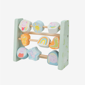 The Grow With Peppa Pig Wooden Abacus by TP Toys features three horizontal rods with spinning blocks displaying colorful images of animals, shapes, and weather symbols—perfect for sensory play and supporting fine motor skill development.