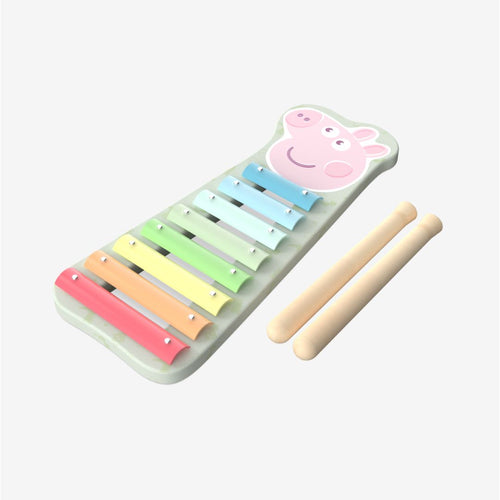 The Grow With Peppa Pig Wooden Xylophone by TP Toys features pastel colors and a charming cartoon pig shape, with eight bars and two wooden mallets—an adorable musical toy for toddlers that’s perfect as their first instrument.