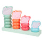 The TP Toys Grow with Peppa Pig Wooden Family Ring Stacker features four Peppa Pig character faces on colorful rings, stacked by size on a light green base—ideal for developing fine motor skills.