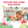 A young girl enjoys sensory exploration with the TP Toys Grow with Peppa Pig Wooden Activity Cube, featuring Peppa Pig graphics and the text "Explore and Learn with Peppa.