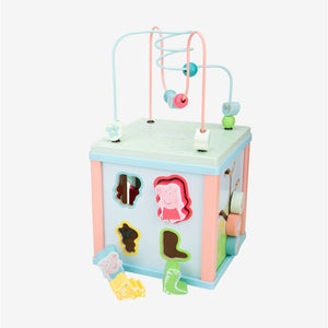 The Grow with Peppa Pig Wooden Activity Cube by TP Toys features a pastel-colored design, a bead maze on top, animal-shaped cutouts on the sides, and matching animal pieces—perfect for developing fine motor skills and sensory exploration.