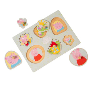 The TP Toys Grow with Peppa Pig Wooden Puzzle Set features removable pieces of Peppa, her family, and their house—ideal for developing fine motor skills and hand-eye coordination.
