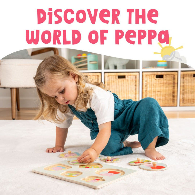 A young child enjoys the TP Toys Grow with Peppa Pig Wooden Puzzle Set on a carpet, building hand-eye coordination, beneath the banner “Discover the World of Peppa.”.