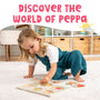A young child enjoys the TP Toys Grow with Peppa Pig Wooden Puzzle Set on a carpet, building hand-eye coordination, beneath the banner “Discover the World of Peppa.”.