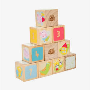 The Grow with Peppa Pig 10 Piece Wooden Block Set by TP Toys showcases a whimsical arrangement of numbered wooden blocks adorned with favorite Peppa Pig characters and vibrant illustrations, all set against a clean white background to inspire imaginative play.