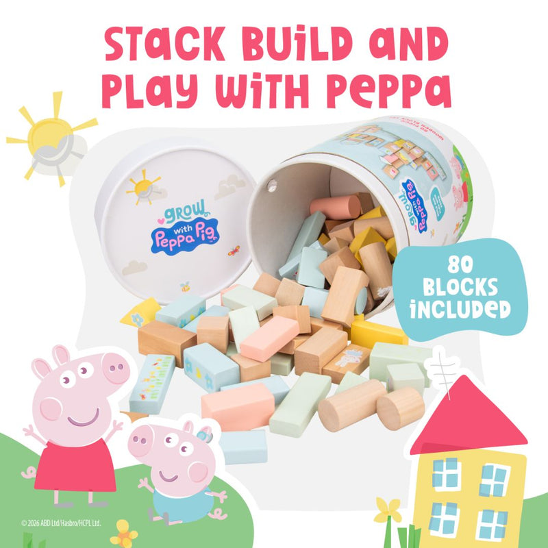 The TP Toys Grow with Peppa Pig 80 Piece Wooden Block Set is shown open with blocks spilling out, featuring vibrant Peppa Pig graphics and encouraging fine motor skills development.