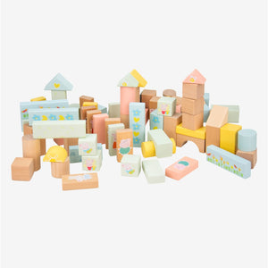 The TP Toys Grow with Peppa Pig 80 Piece Wooden Block Set features an assortment of pastel-colored wooden building blocks in various shapes and printed designs, arranged on a white background to help develop fine motor skills.