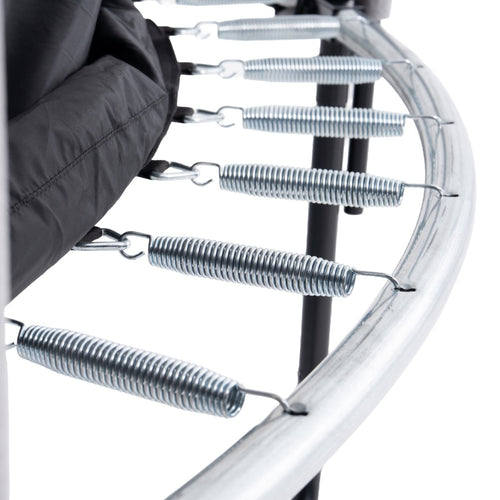 Close-up of metal springs on the TP Toys TP Genius® 8ft Round Trampoline frame, with part of the mat visible, highlighting trampoline safety features.