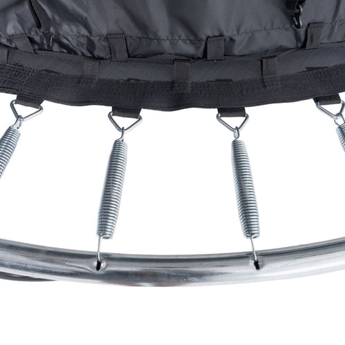 Close-up of metal springs attached to the galvanized steel frame and black jumping mat of the TP Genius® 12ft Round Trampoline by TP Toys, highlighting its durability and quality craftsmanship.