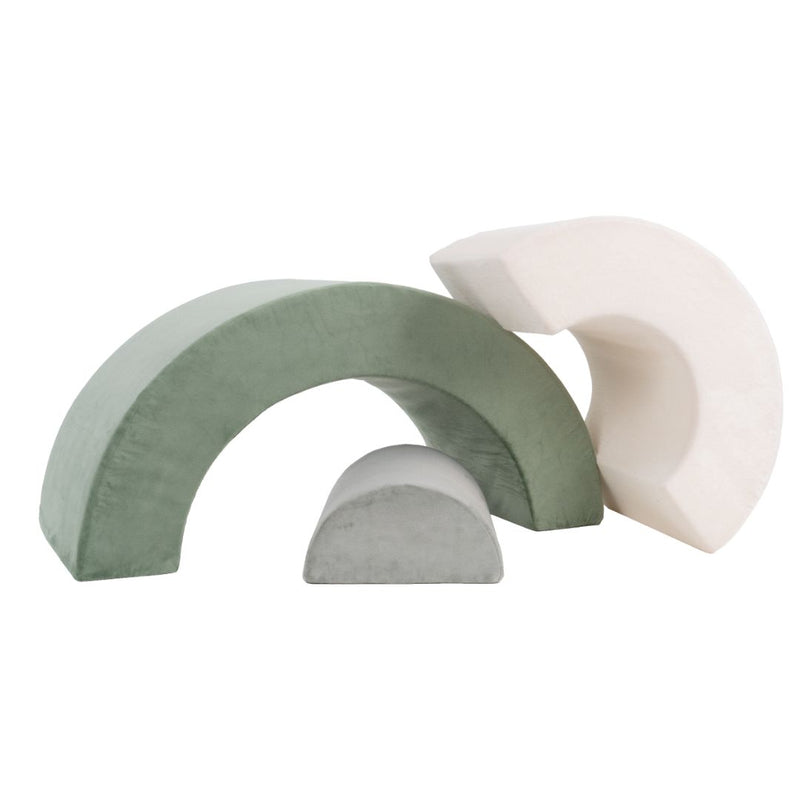 The TP Toys TP Active-Tots Pikler Style Rainbow Arch Playset features three soft foam blocks in pastel green, gray, and white, forming a rainbow arch ideal for Montessori toddler play and developing gross motor skills.