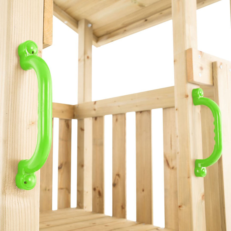 Close-up of the TP Toys Skywood Wooden Lookout Tower with 3m Super Wavy Slide – FSC® certified, showing two green plastic handles fixed to vertical wooden beams as part of this modular outdoor climbing playset.