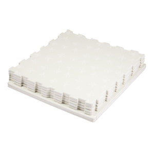 The TP Active-Tots Safety Play Mats by TP Toys are interlocking, non-toxic foam floor tiles with a subtle pattern—perfect for creating a safe and stylish toddler play area.