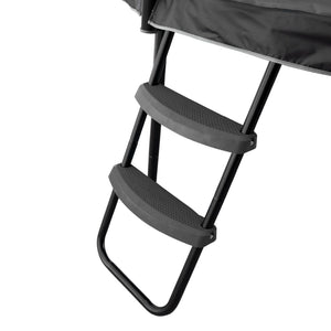 A heavy-duty black metal two-step TP Trampoline Ladder for Infinity Leap, Infinity Round 10ft & 12ft & Genius 14ft Trampolines attached to the frame of an infinity trampoline.