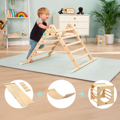 A toddler plays on a TP Toys Active-Tots Pikler Style Climbing Triangle in a playroom with toys, dresser, and light blue mat. At the bottom are three Montessori toys, including the FSC® certified climbing bridge from the same set.