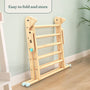 The TP Toys TP Active-Tots Pikler Style Wooden Climbing Triangle, FSC® certified, is shown folded against a pale green wall with the text "Easy to fold and store"—a perfect indoor climbing solution for toddlers.