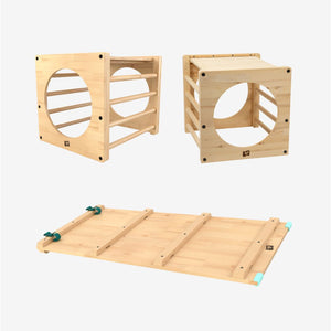 Transform your playroom with the TP Toys Active-Tots Pikler Style Two Climbing Cubes & Bridge—crafted from FSC® certified wood for safe, sustainable fun. This versatile indoor set features two wooden climbing cubes with circular openings and a detachable flat bridge, inspiring active, imaginative play in true Montessori fashion. For extra adventure, incorporate the connecting bridge to create an engaging obstacle course that keeps little explorers challenged and entertained—all beautifully arranged on a