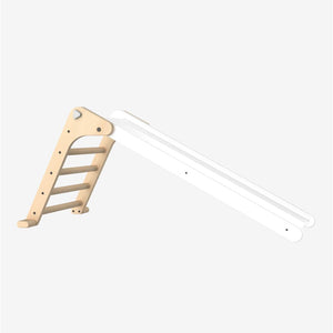 The TP Toys TP Active-Tots Pikler Style Folding Wooden Slide - FSC® certified, shown here with an attached white slide against a plain light background, provides versatile indoor play as a Montessori-inspired toy. This folding wooden slide encourages imaginative exploration and active learning for children.