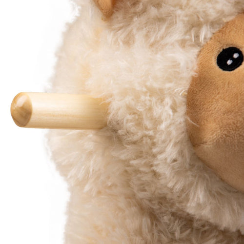 Close-up of the TP Toys Active-Tots Rocking Llama, a soft plush rocker shaped like a llama, featuring a wooden peg on its side against a white background.