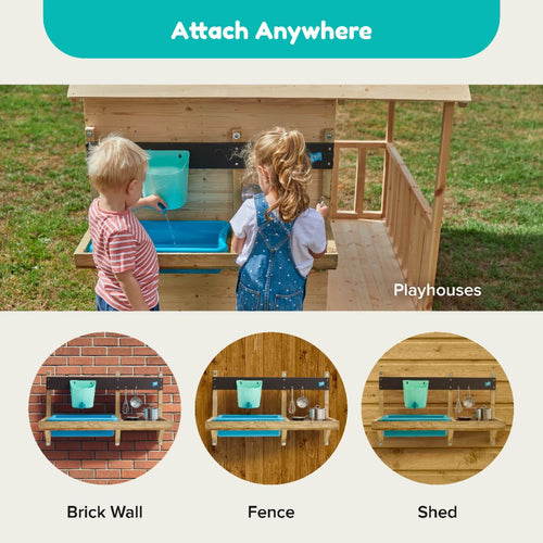 Two children enjoy the TP Deluxe Mud Kitchen Playhouse Accessory by TP Toys, a fun FSC® certified water activity station that can be mounted on a wooden playhouse, brick wall, fence, or shed.