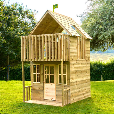 The TP Toys TP Loft Two Storey Wooden Playhouse – FSC® certified, features a balcony, windows, and a small porch, making it the perfect outdoor playhouse for kids to enjoy fun on the lawn.
